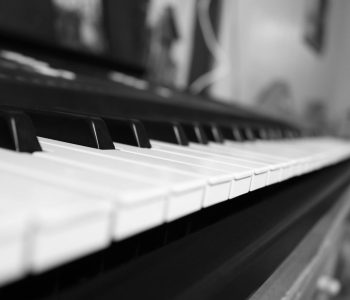 grayscale photo of piano tiles