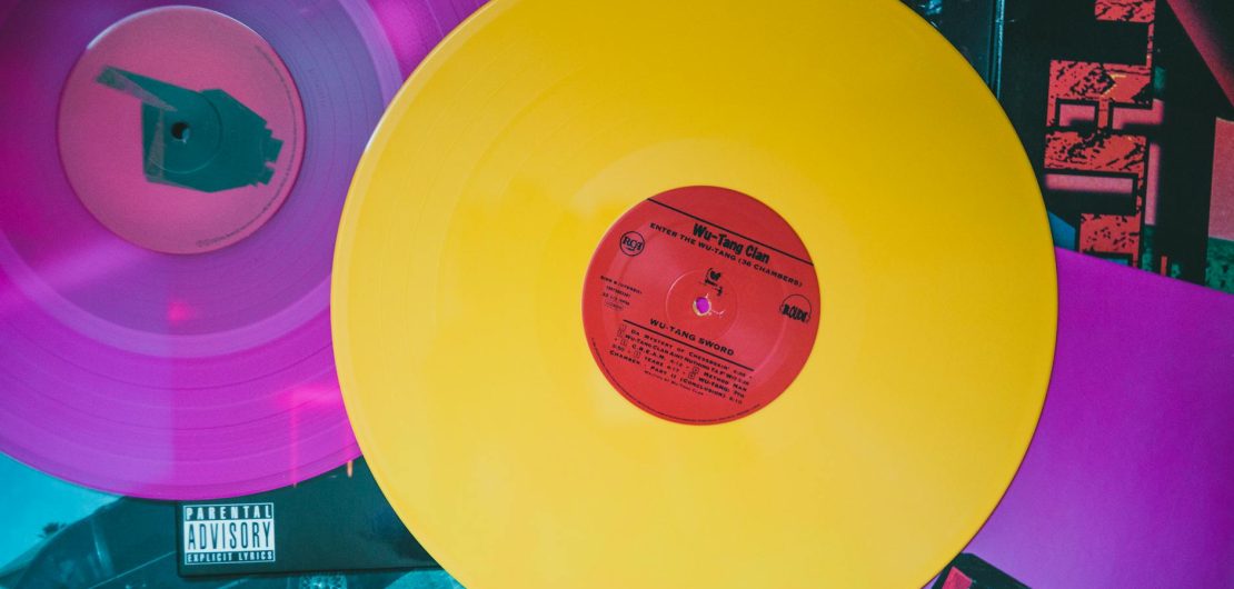 colorful vinyl records and album covers